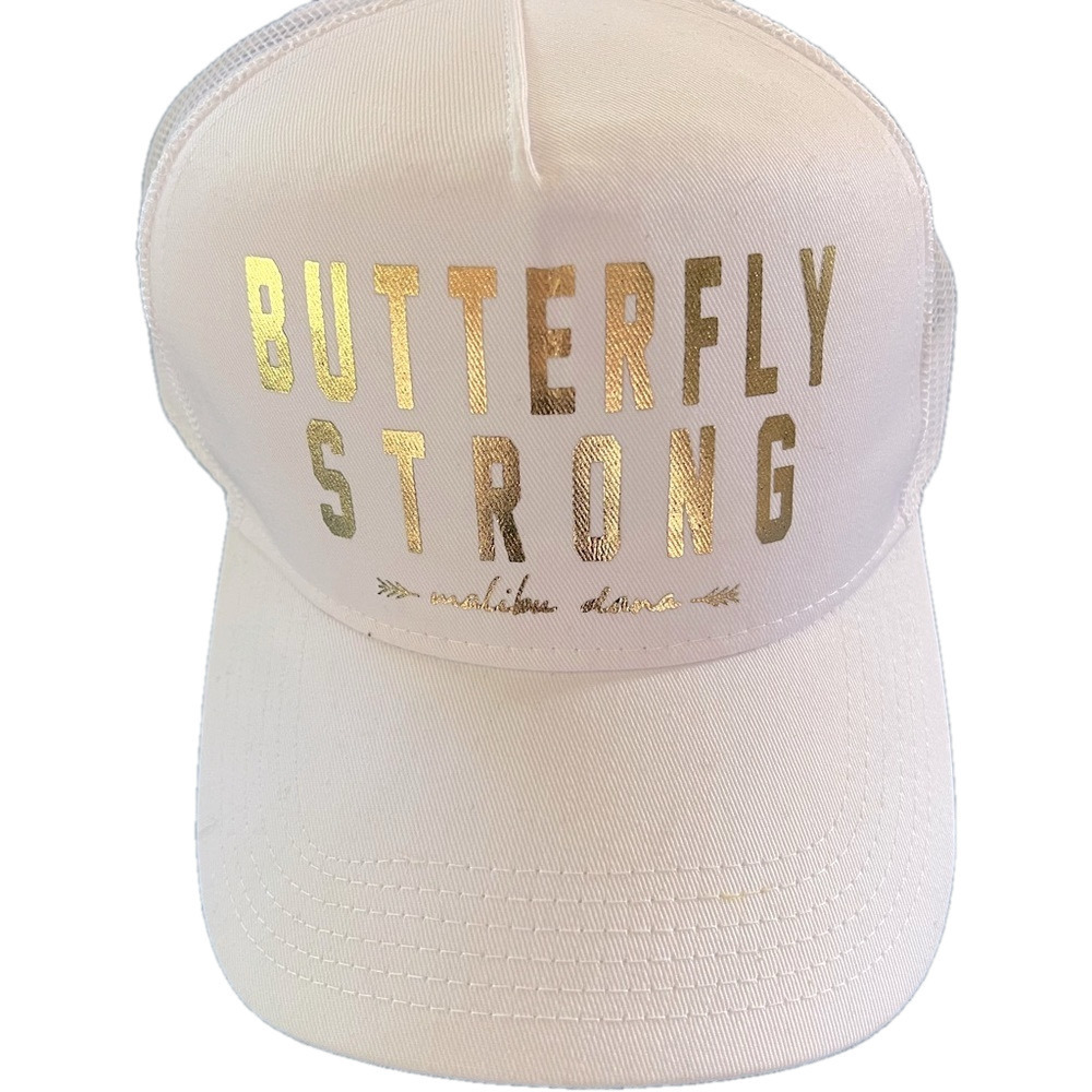 Hat adjustable sizing. White with gold lettering. Butterfly Strong. Mesh back.